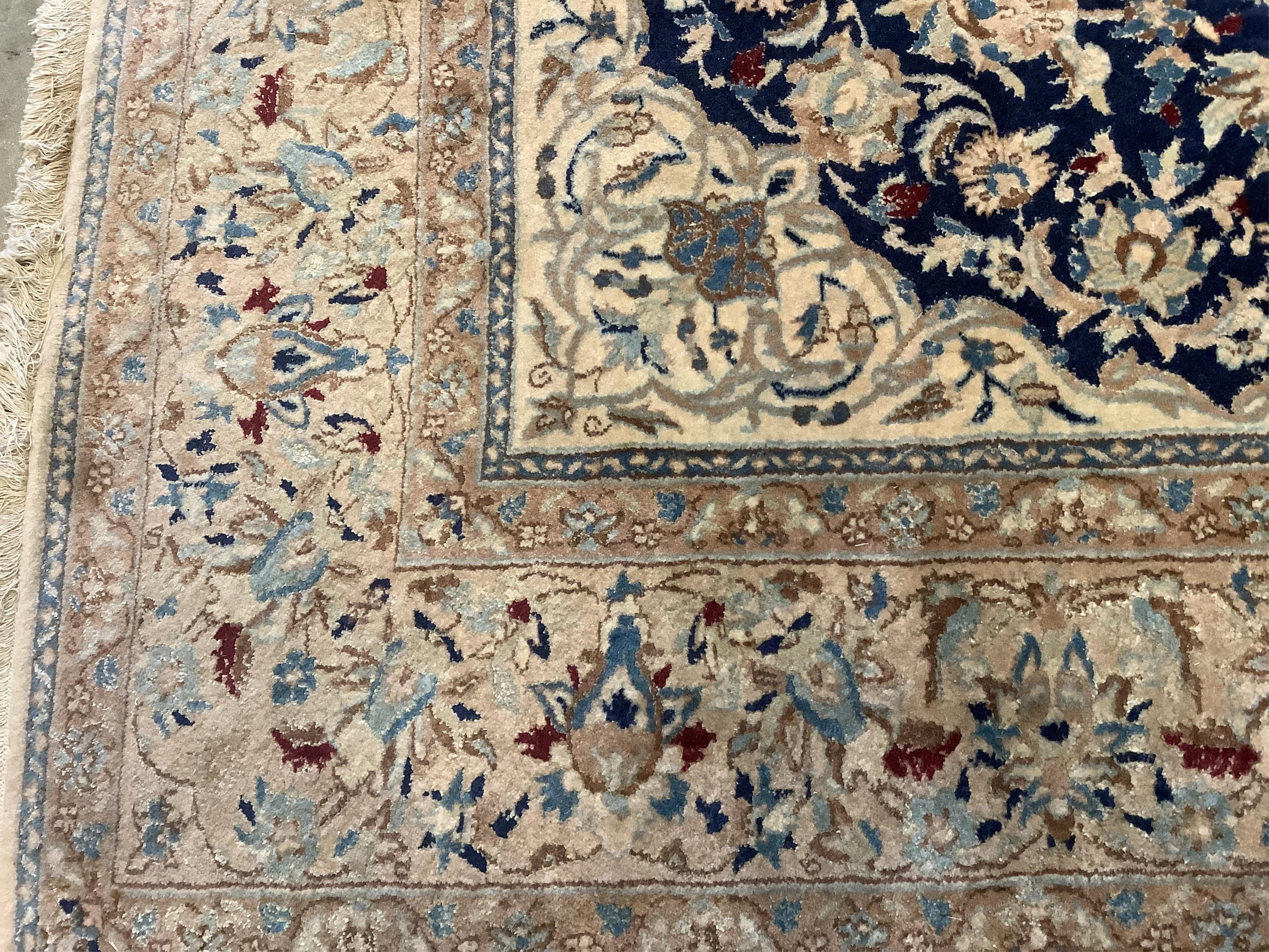 A Nain blue ground carpet, 277 x 174cm. Condition - fair to good